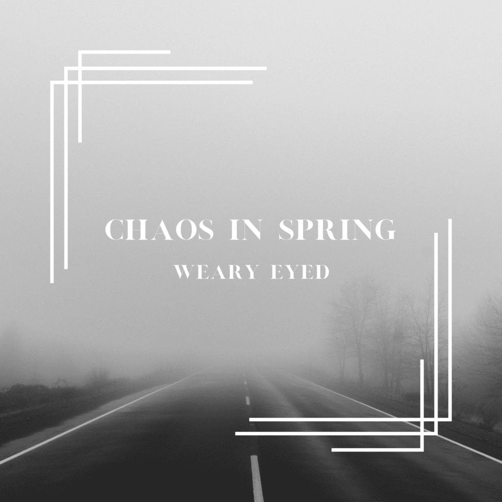 Chaos in Spring "Weary Eyed" album cover. A foggy forest cut in half by a road (asphalt) and the title between two corner pieces.